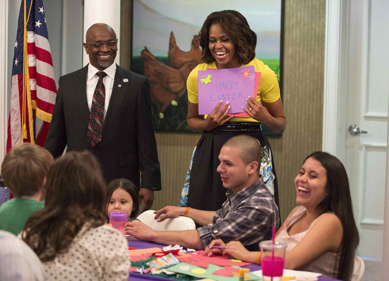 Michelle Obama plays with kids