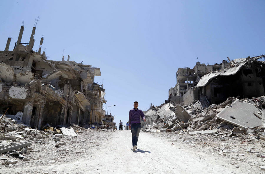 Syrians return to damaged homes