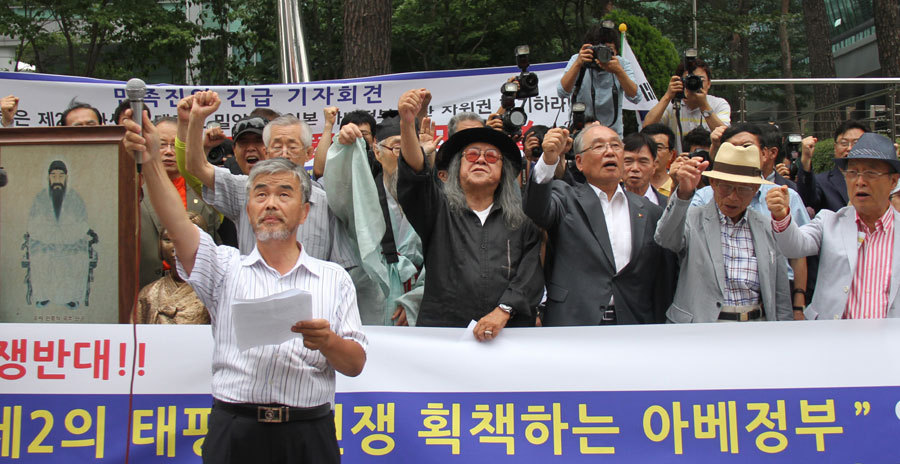Korean protest against Japan to lift ban on collective self-defense right
