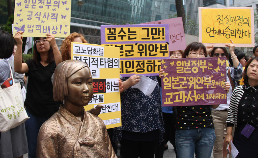 Korean protest against Japan to lift ban on collective self-defense right