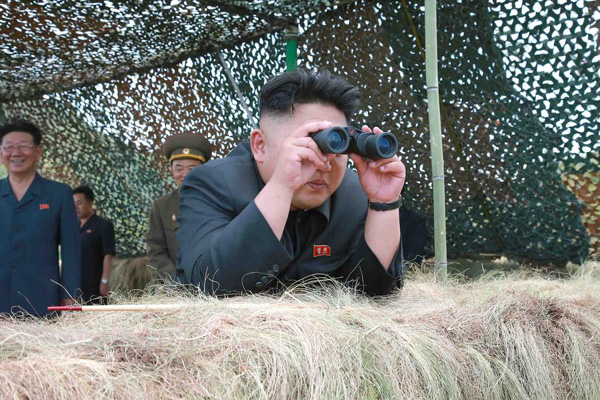 DPRK leader Kim guides live shell firing exercise