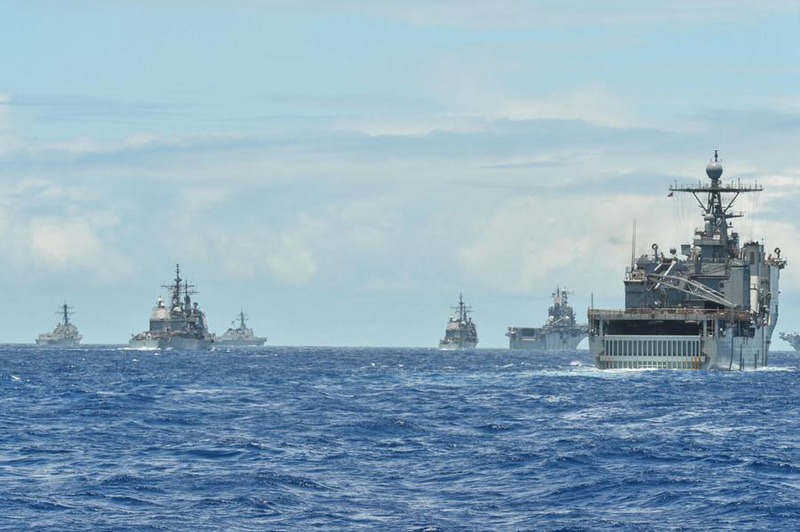 Naval vessels conduct exercises