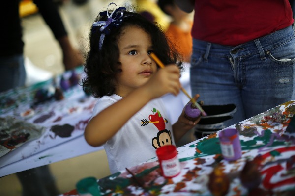 Venezuelans fashion toys to welcome Gaza's children