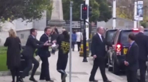 Cameron is confronted in London