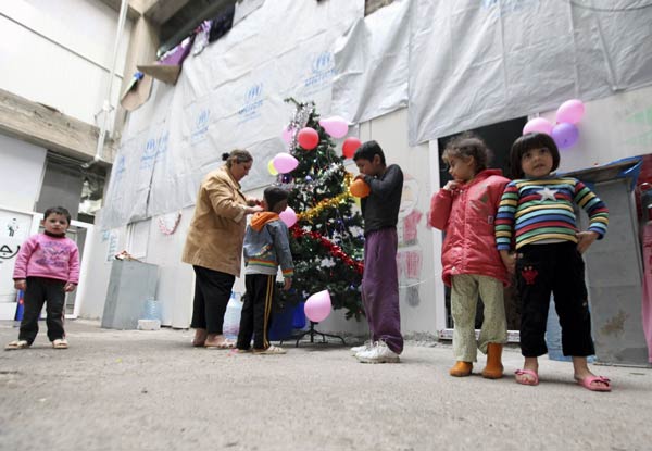 Baghdad's Christians gather defiantly for Christmas Eve mass