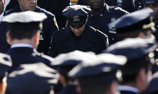 Angry police shun NYC mayor at funeral for slain officer