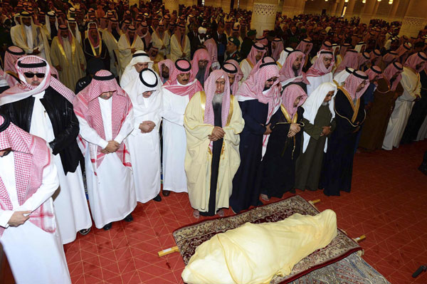 Saudi King Abdullah mourned in simple burial