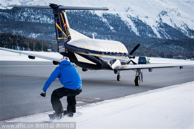 Snowboarder towed by a plane reaches speed of 78mph