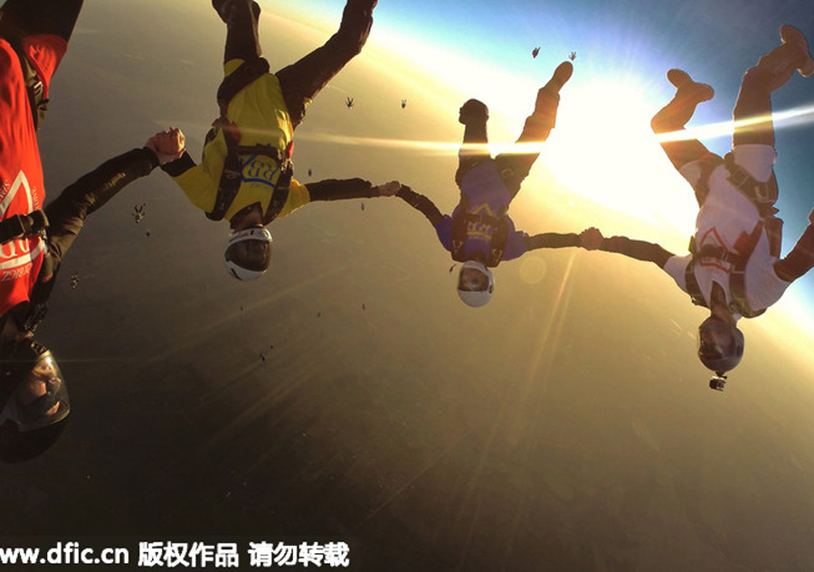 Skydivers perform breaking feat for departed friend