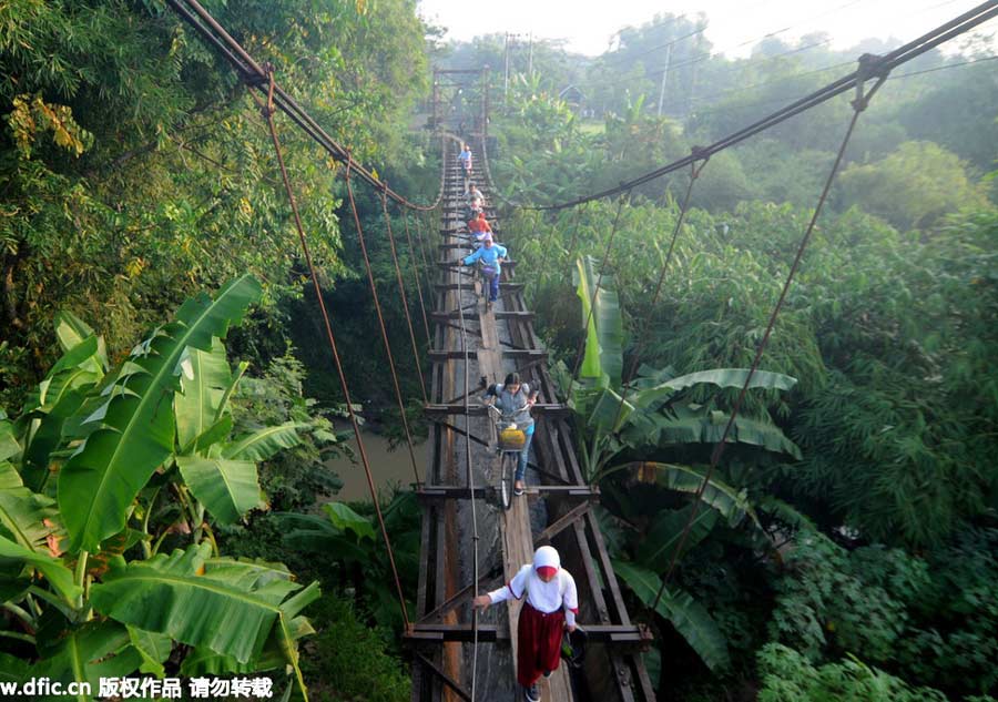 Indonesian children's risky shortcut to get to school