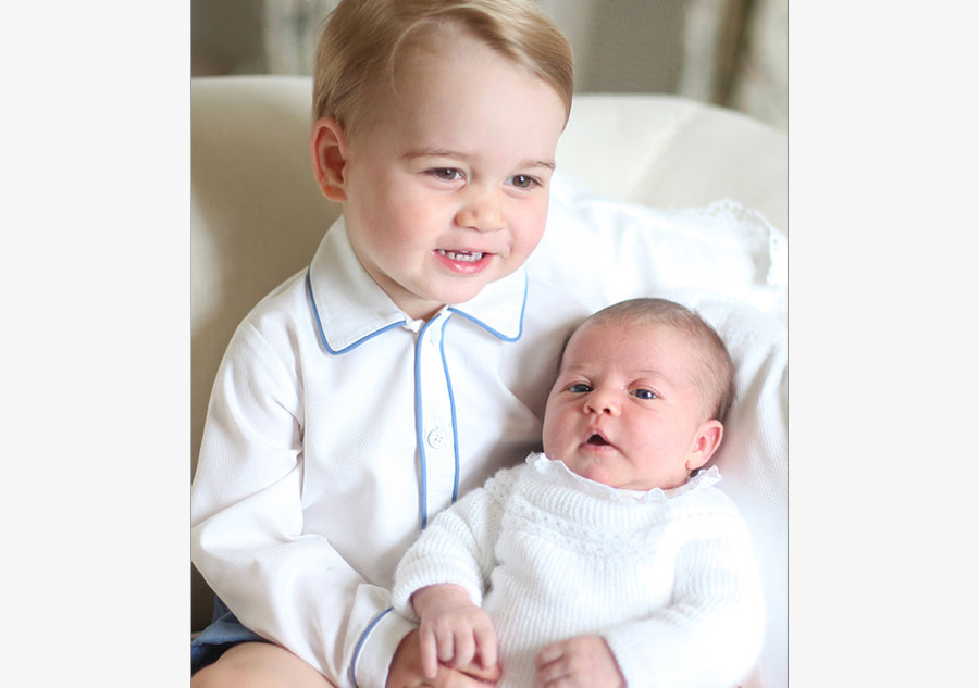 Photos show Princess Charlotte, Prince George together