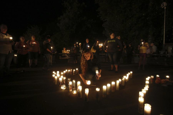 Candlelight vigil for Oregon shooting victims