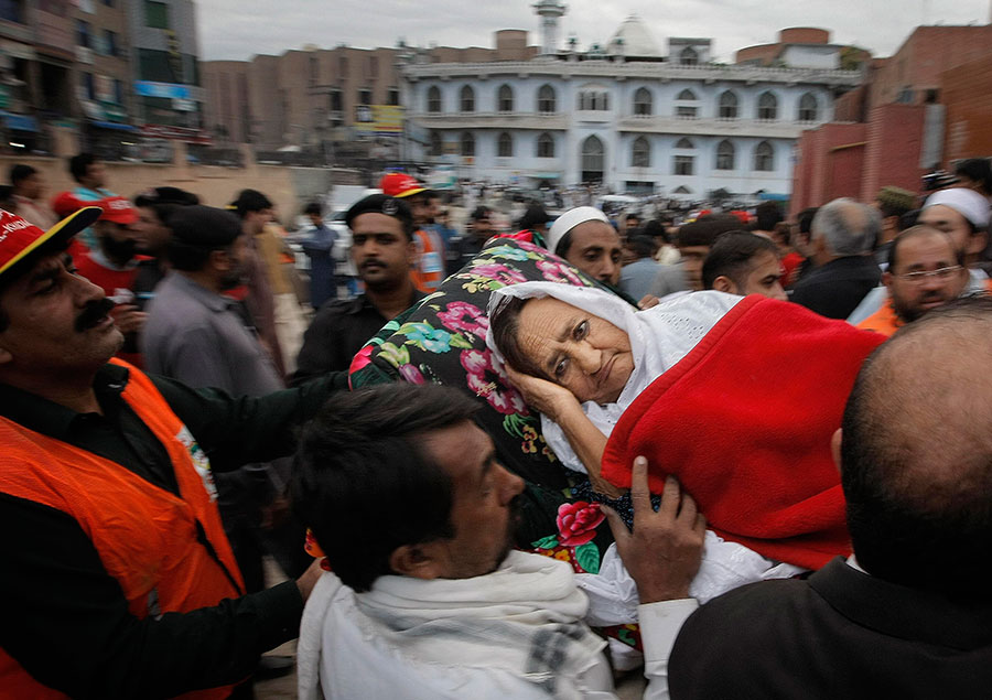 Survivors receive treatment after strong earthquake in Pakistan