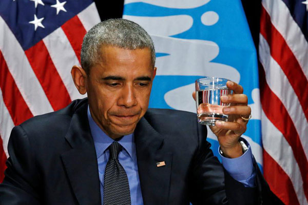 Obama sips Flint water, urges children be tested for lead