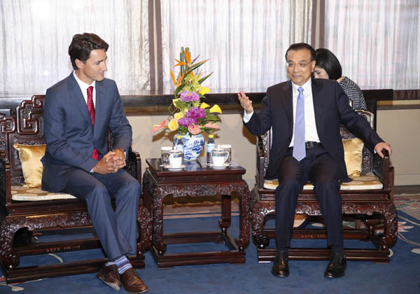 Premier Li welcomes Canadian Prime Minister in Forbidden City