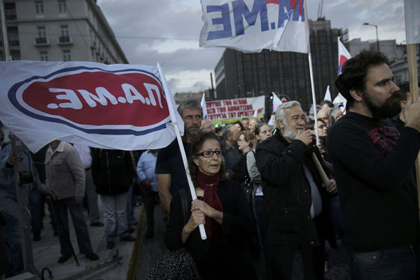 Greeks rally against labor reforms, as talks with creditors set to begin this week