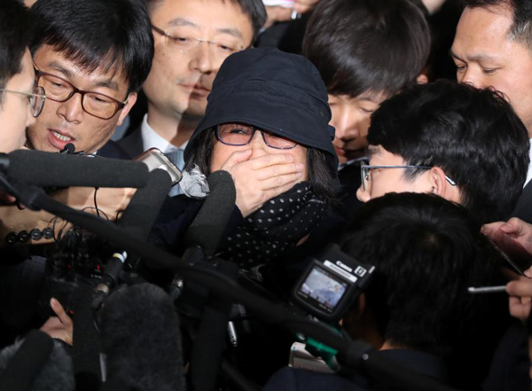 South Korean prosecutors arrest woman at centre of political crisis: media