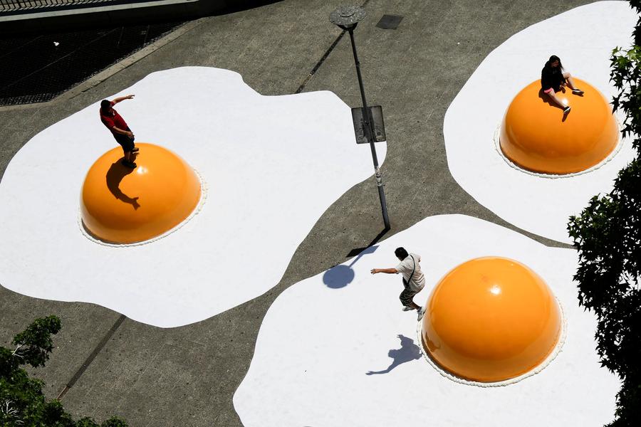 Streets are alive with giant fried eggs in Santiago