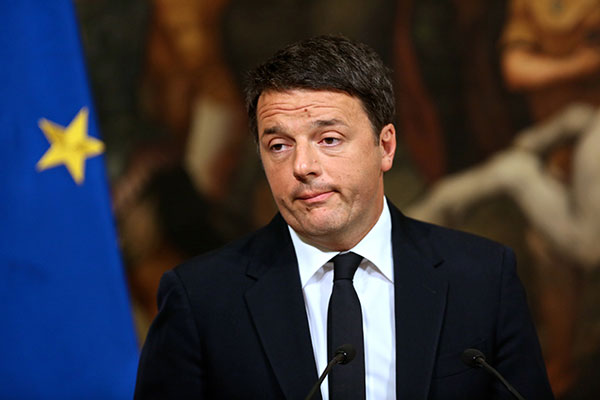 Italy's Renzi formally steps down, transition cabinet expected