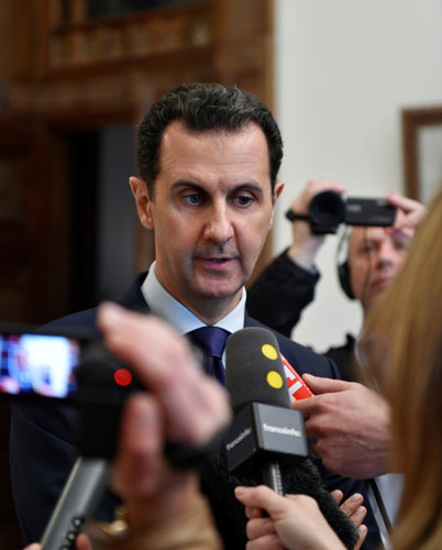 Syria truce under strain; Assad ready to discuss 'everything' at talks