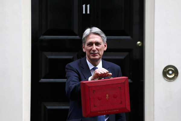 UK faces tougher Brexit challenge after 2017 resilience - Hammond