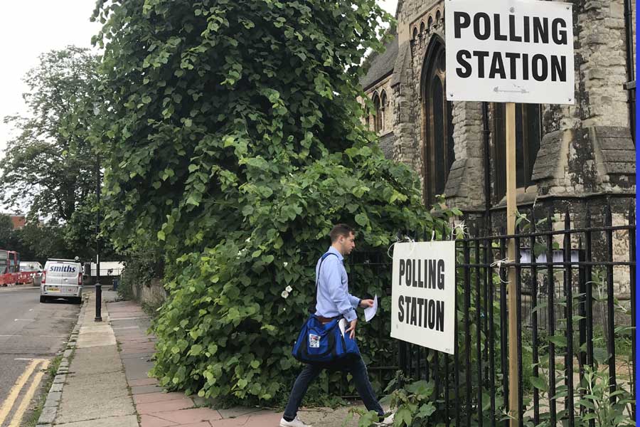 UK general election exit polls show May's Conservatives could be largest party