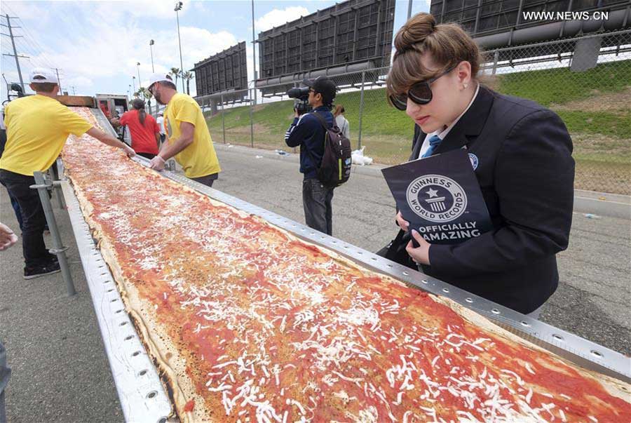 World's longest pizza breaks Guinness Records in US