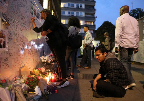 Grief turns to anger as people seek answers for deadly fire in London