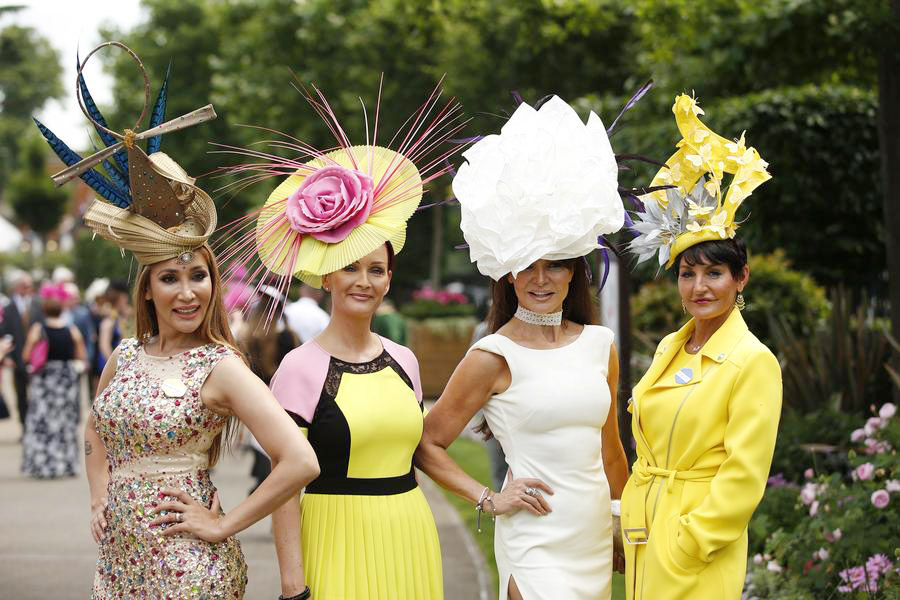 Despite high temps, Royal Ascot-goers don finest outfits