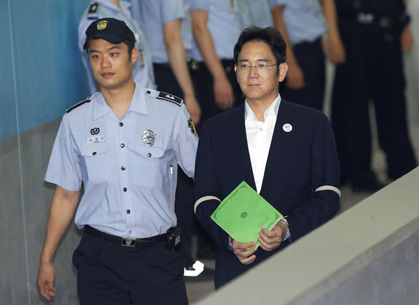 S. Korean prosecutors seek 12-year sentence for Samsung heir