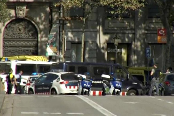 Barcelona in lockdown as police search for terrorists
