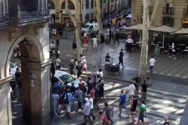 Barcelona in lockdown as police search for terrorists