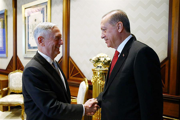 Erdogan says Turkey unease over US support for YPG