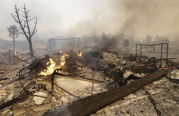 Windy wildfires sweep through California wine country