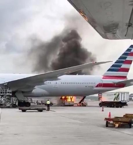 American Airlines cancels flight after loading equipment catches fire