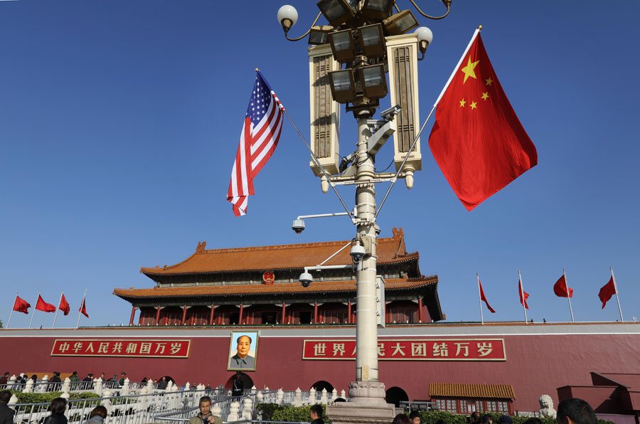 National flags of China and US fly along Chang'an Avenue before Xi-Trump meeting