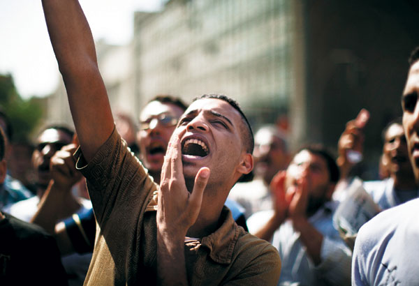 Protests continue as verdict in Mubarak case divides Egyptians