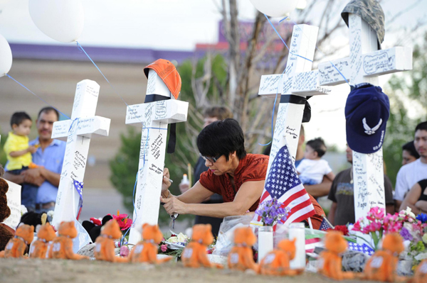 Denver residents mourn shooting victims