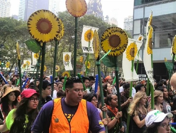 Tens of thousands crowd New York streets for climate march