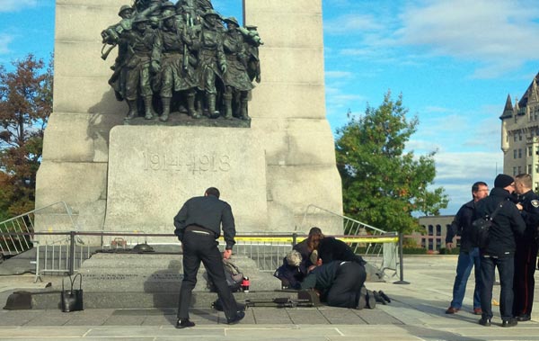 Shooting locks down Canadian parliament, one suspect reported dead
