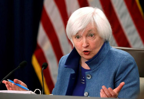 Fed leaves interest rates unchanged, remains upbeat on economy