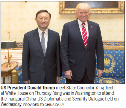 Progress in ties beneficial, Yang tells Trump