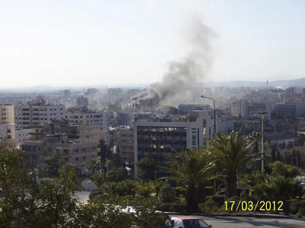 Blasts in Syrian capital kill 27