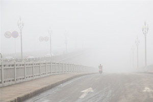 Beijing upgrades haze alert from yellow to orange