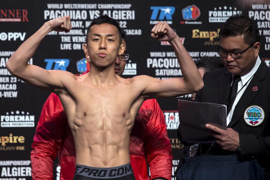 China's boxer Zou guaranteed shot at Amnat Ruenroeng in 2015
