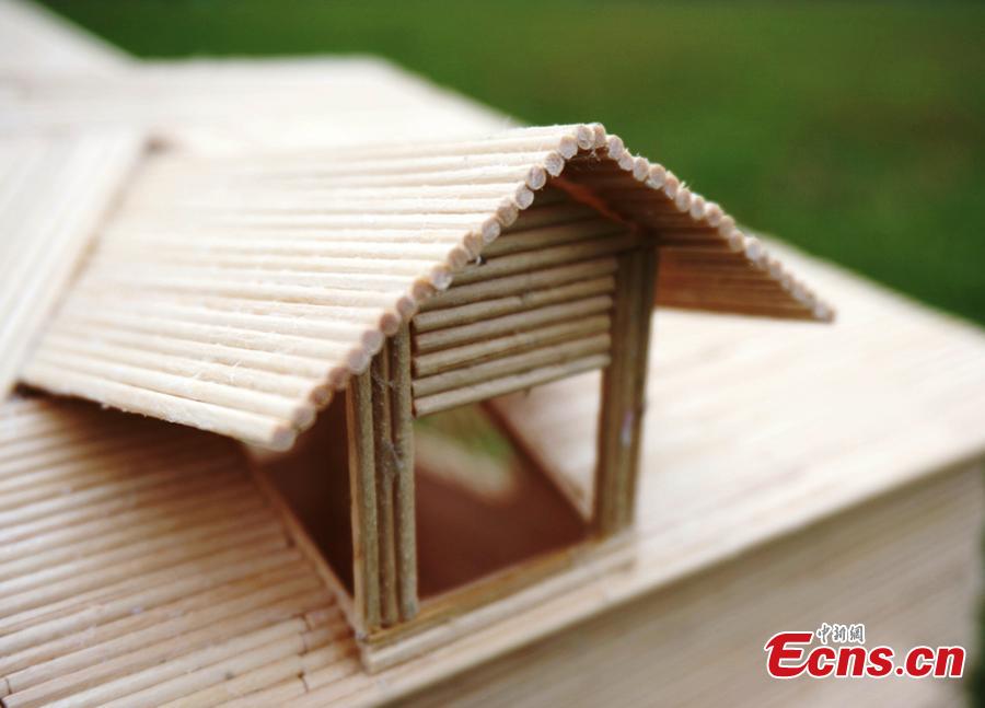 Students create 'villas' with small wooden sticks