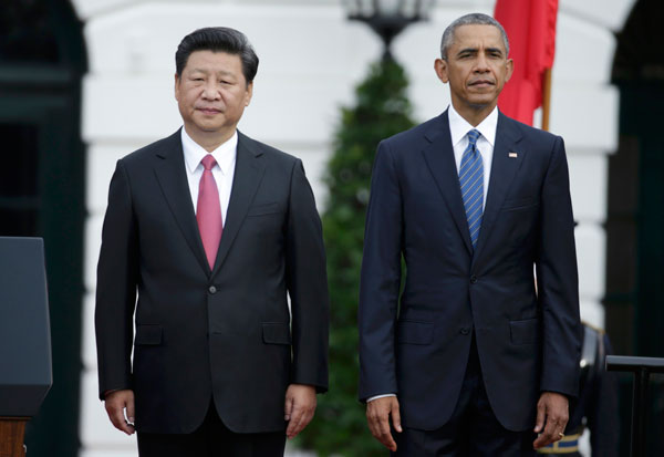 President Obama greets President Xi with <EM>nihao</EM> on state visit