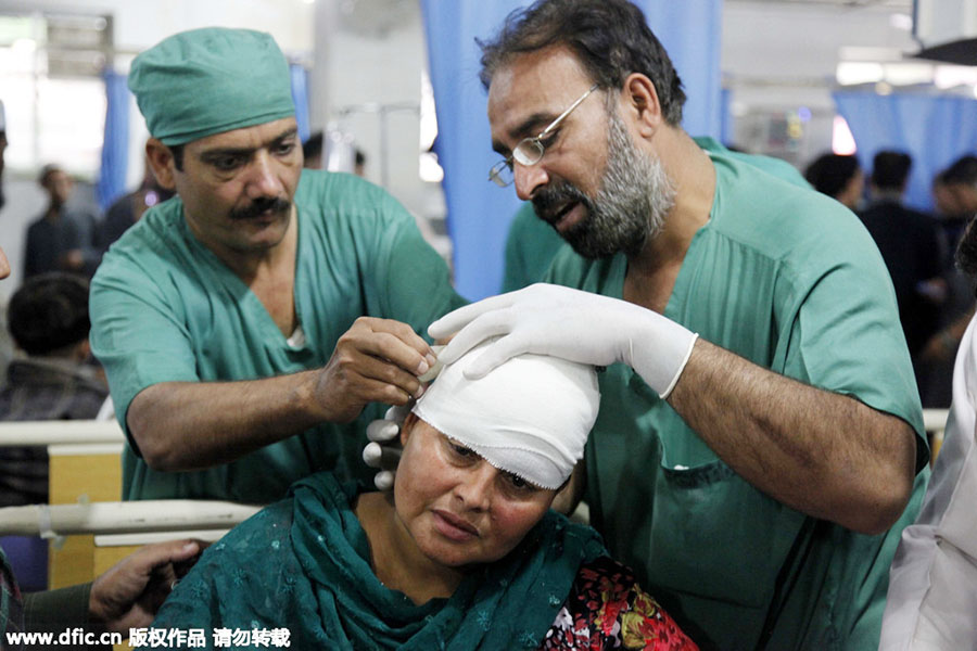 Survivors receive treatment in Pakistan after strong quake