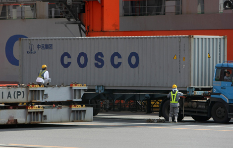 COSCO reports H1 loss of $432 million
