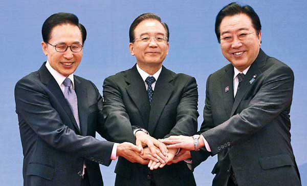 China signs investment agreement with Japan, ROK